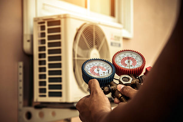 Professional Hvac technician working in Hickory Valley, TN